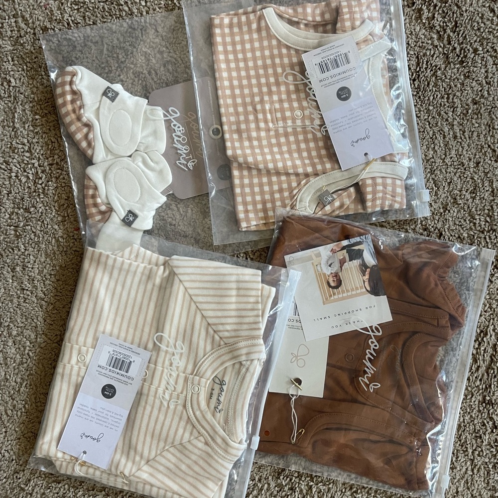 New in bag size 3-6 months 2 rompers, 1 footie, and 1 booties